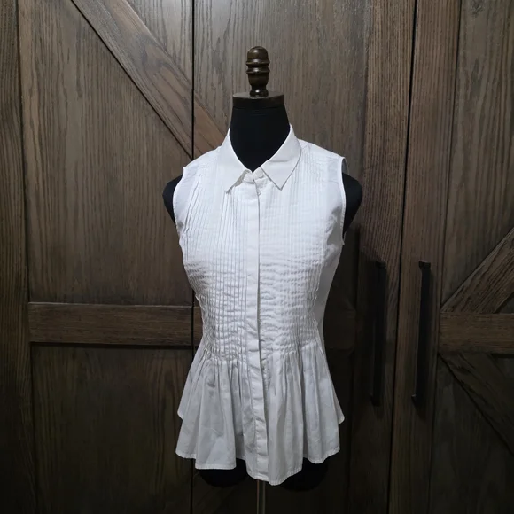 Theory Ivory Sleeveless Peplum Blouse - Picture 1 of 3